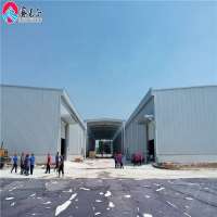 Cheap warehouse prefabricated houses factory industrial warehouse design prefab sheds light steel factory